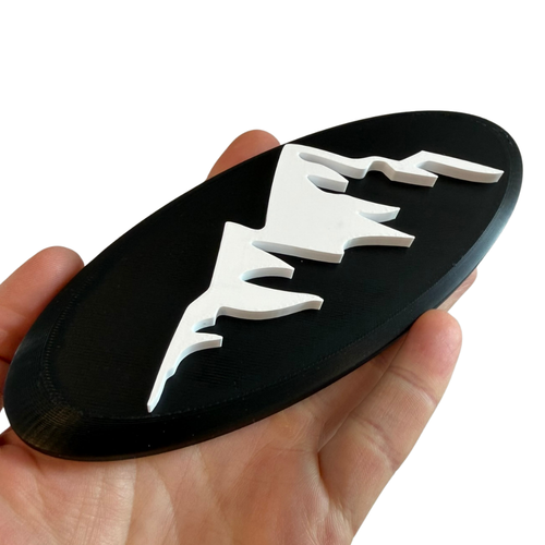 Mountains front grille badge Ford Transit - black mountains variant