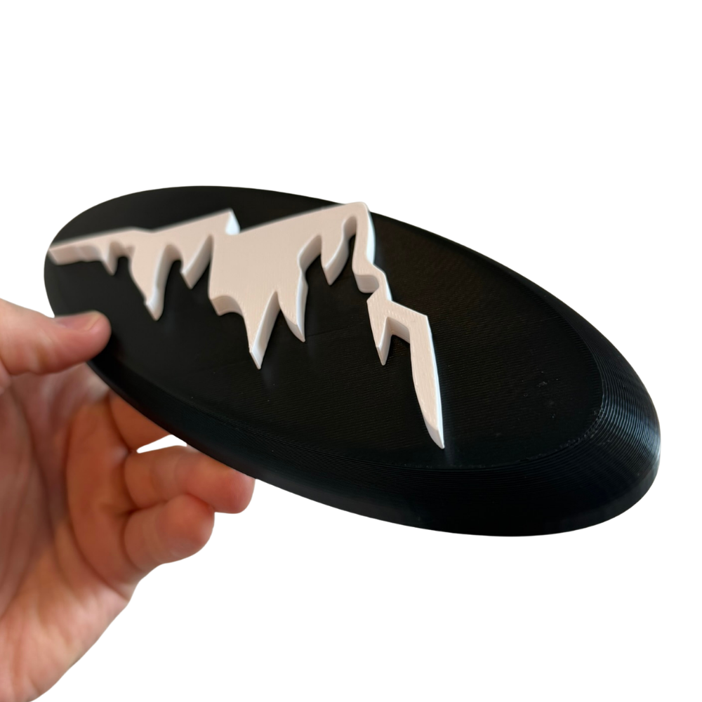 Mountains badge for Ford Transit - white mountains on black background