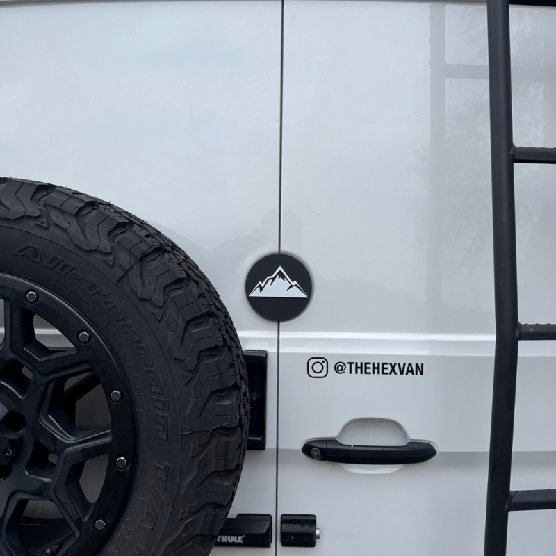 Mountains badge fitted on Mercedes Sprinter rear door