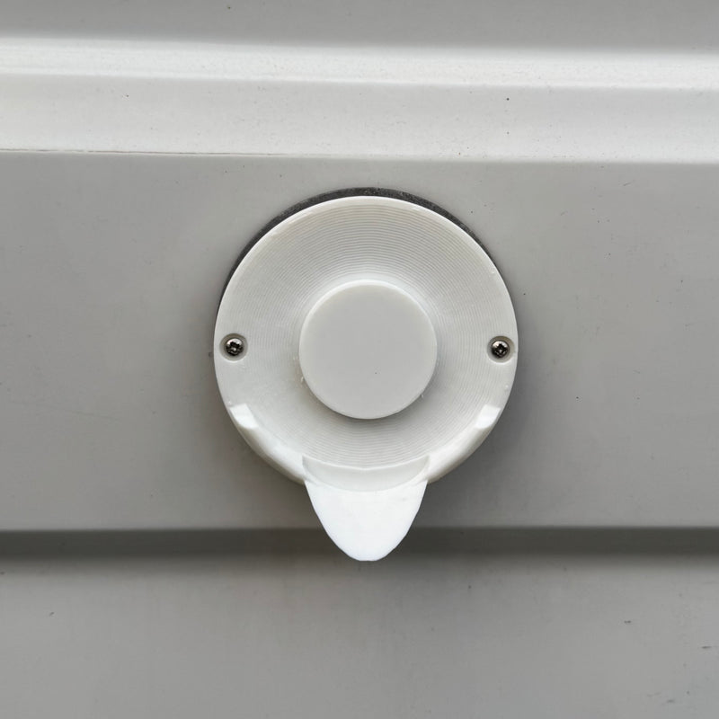 Truma boiler outlet drip cover installed on van - real photo