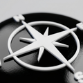 Compass badge for VW Transporter - black compass on white background